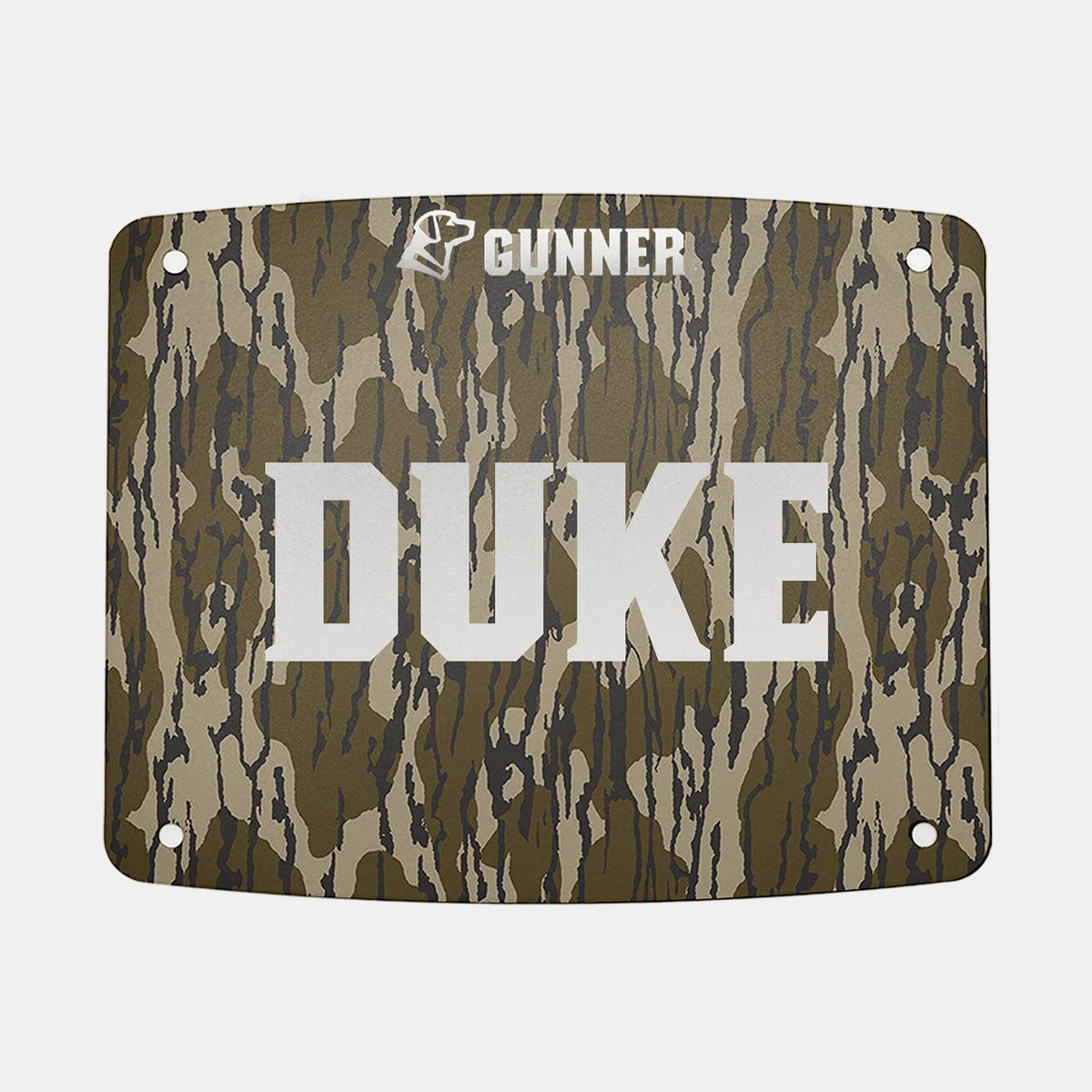 Rectangular camouflage-patterned FOOD CRATE NAME PLATE by GUNNER, featuring large white “DUKE” text in the center and “GUNNER” with a dog icon above it. Designed for personalizing your GUNNER Food Crate, this name plate includes four corner holes for easy mounting.