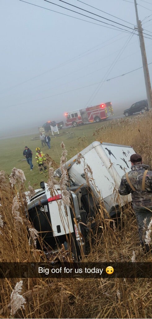 A Truck, A Trailer, A Railroad Crossing & A Ditch