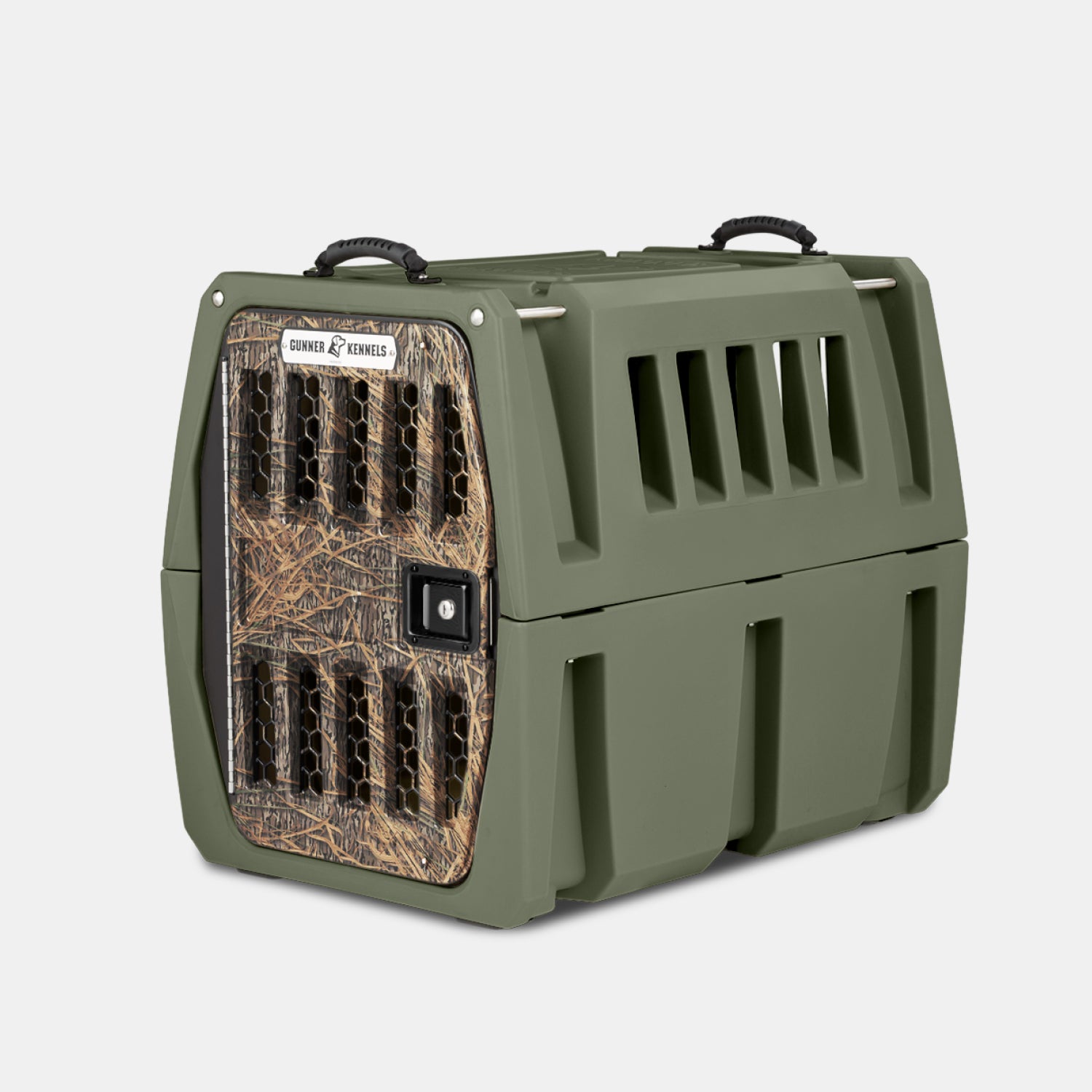 The GUNNER G1™ Kennel in Gunner Green/Mossy Oak Shadow Grass is a durable, American-made, double-walled pet crate with side vents, a camo front door and black latch, plus two top handles—making it a safe choice for dog travel.