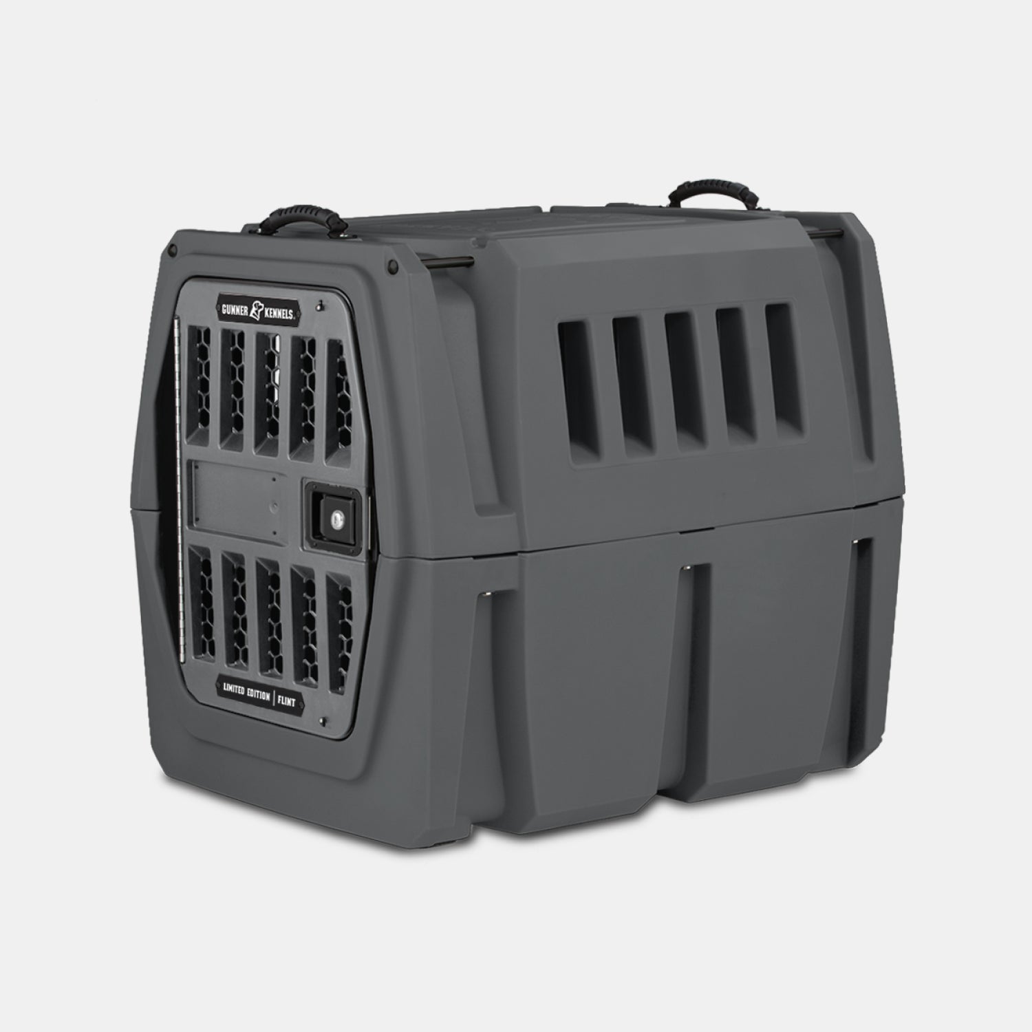 The GUNNER G1™ KENNEL - FLINT is a sturdy dark gray pet crate with vented sides and front, a secure grid door, and top handles for easy carrying—designed to provide top safety when transporting your pet.