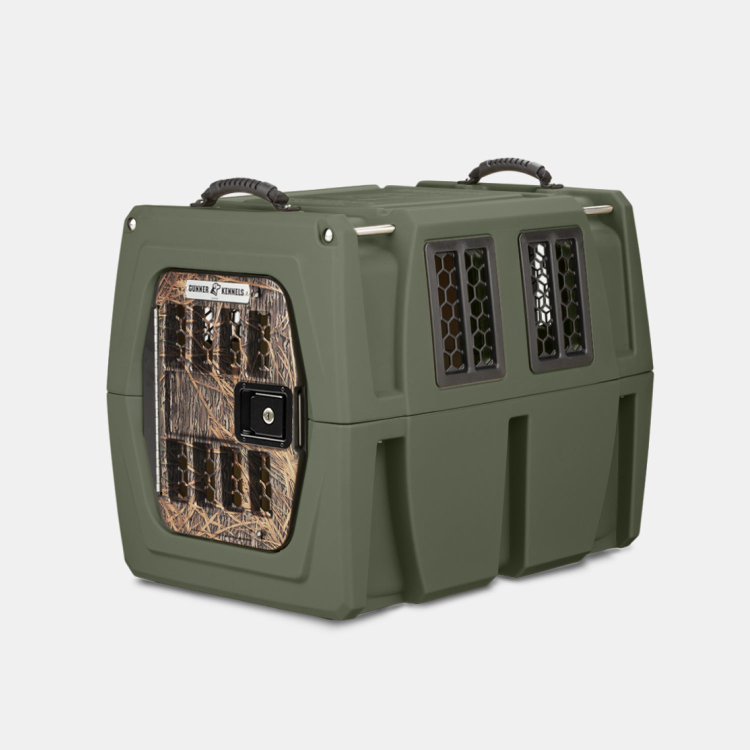 The GUNNER G1™ KENNEL in Gunner Green/Mossy Oak Shadow Grass is a double-walled, American-made kennel featuring a camouflage door, black metal latch, side ventilation windows, and two top carry handles.