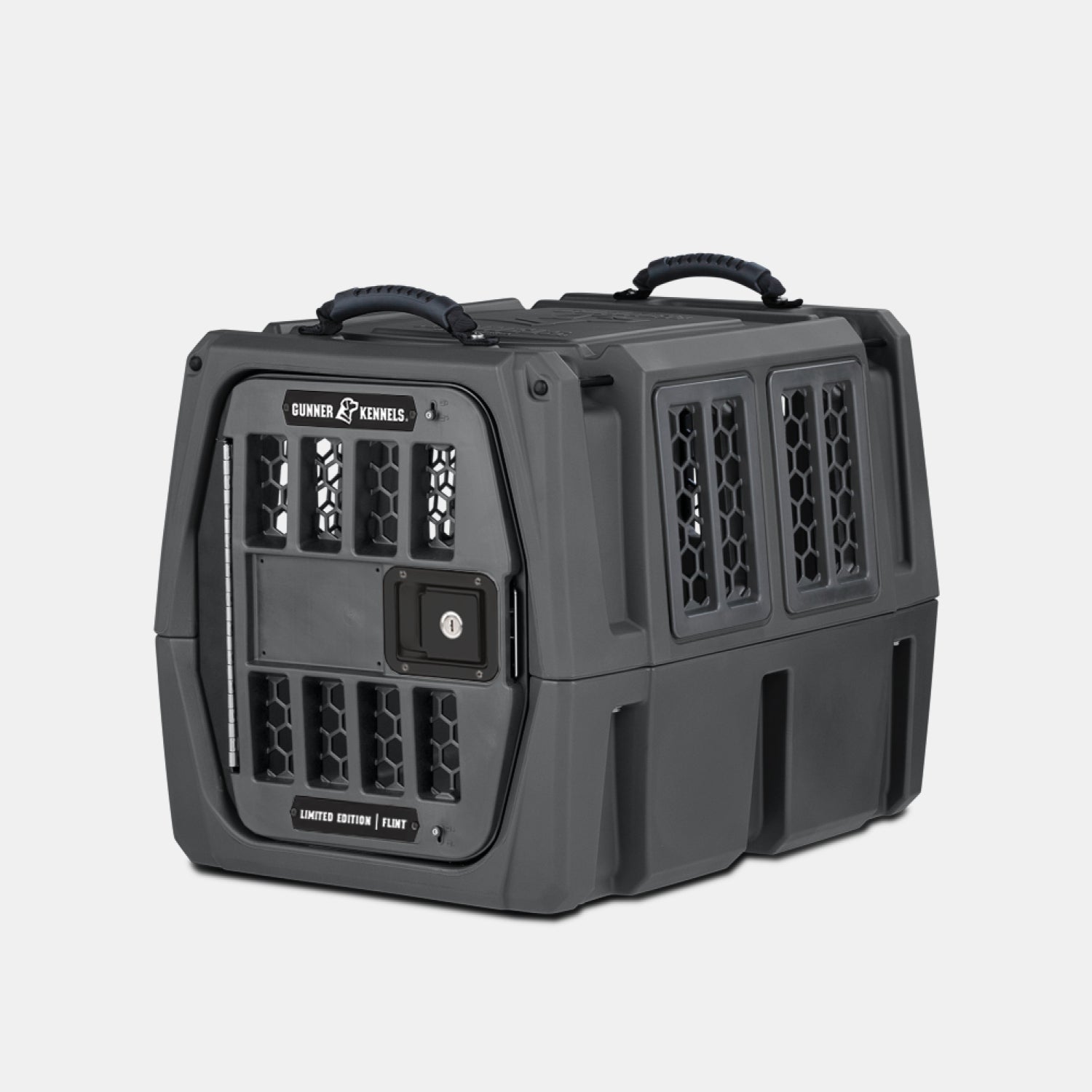 The GUNNER G1™ KENNEL - FLINT is a durable, dark gray pet kennel featuring ventilation slots on all sides, dual top carry handles, and a secure lockable front door—built tough to protect your pet like a premium phone case.