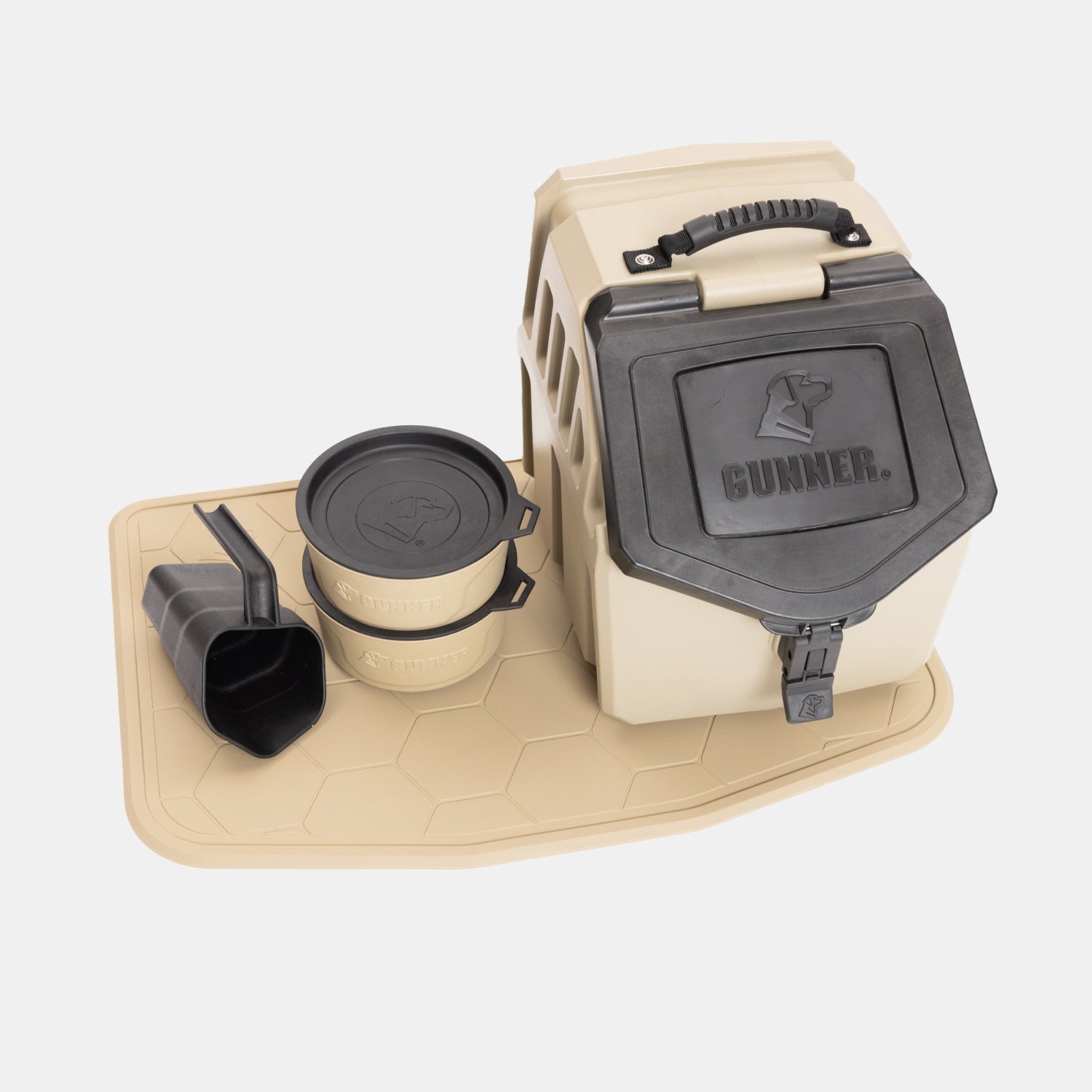 The GUNNER Complete Food & Water Bundle, featuring a tan and black pet food storage container with a handle, two stackable dog bowls, a scoop, and a matching bowl mat, is arranged on a light background.