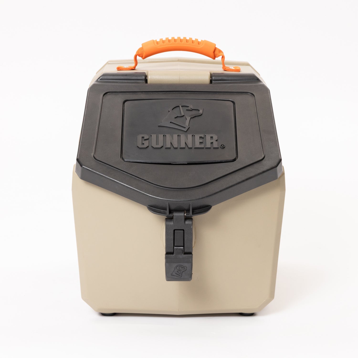 A hard-sided container from GUNNER, featuring the GUNNER logo and a dog head design on the front, comes in beige and black with a rugged, durable appearance. It is equipped with a blaze orange ridged rubber KENNEL HANDLE and matching latch, constructed from GUNNER-Grade materials.