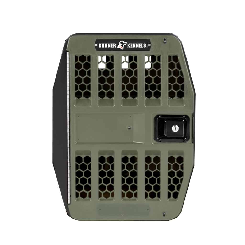 A green and black heavy-duty dog kennel designed for the working dog, featuring a secure latch, ventilation holes on the front, and labeled Gunner Kennels at the top—ideal outdoor gear for your canine companion.