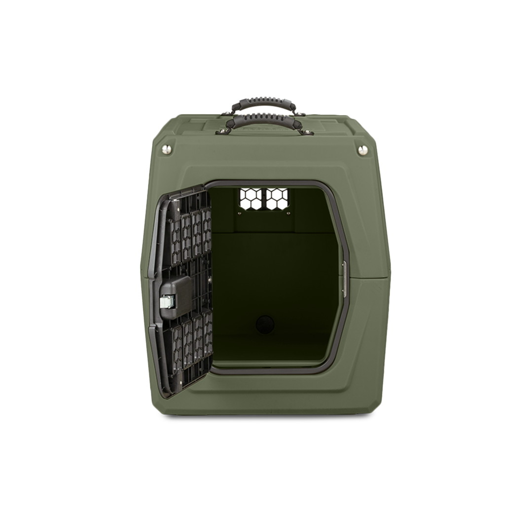 The GUNNER G1™ KENNEL in Gunner Green is a hard-sided pet carrier with a black metal door, double-walled design, top handle, and rear ventilation window for added safety and durability.