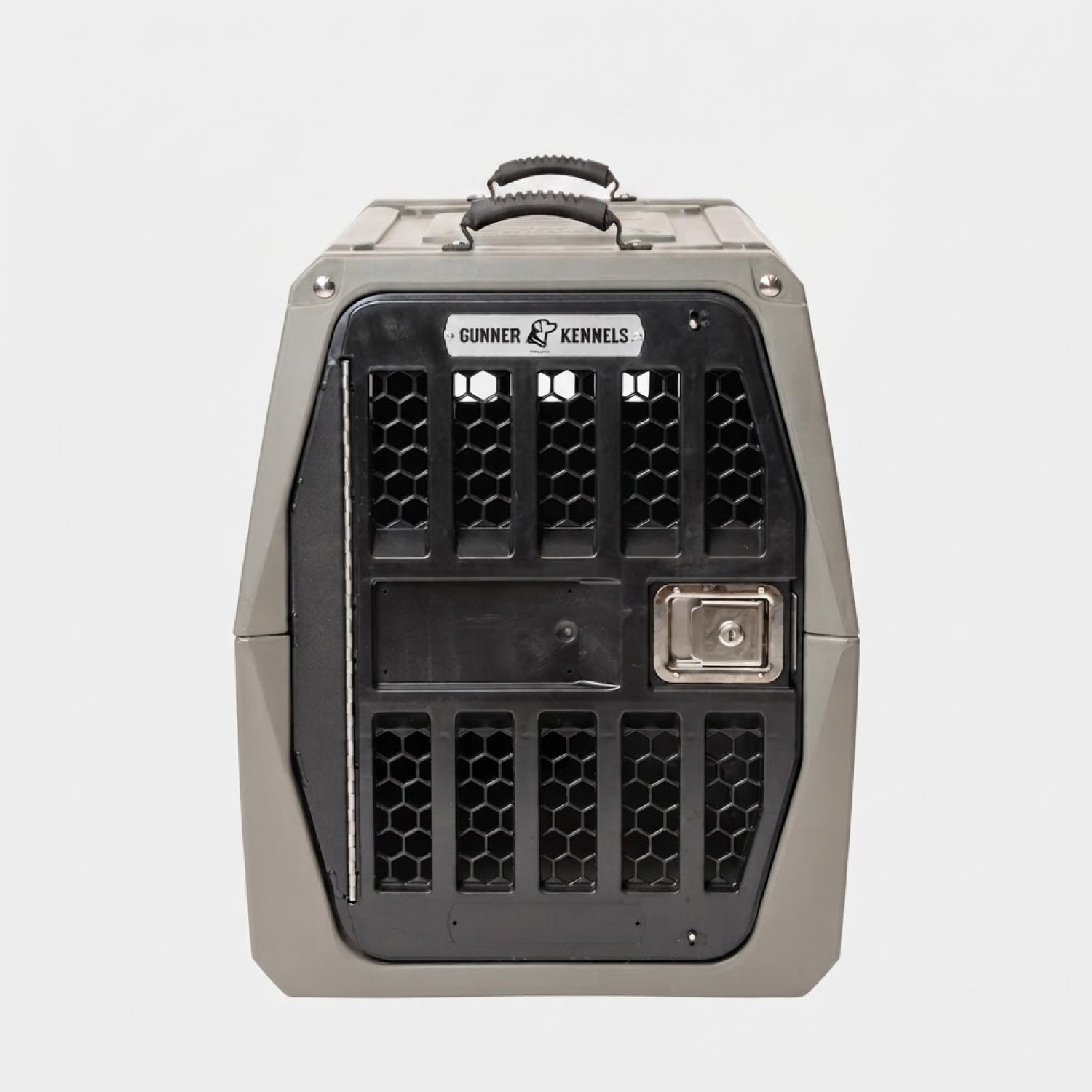 A sturdy, gray GUNNER dog crate equipped with a KENNEL HANDLES - BLACK handle on top, constructed from durable materials and featuring a black metal door with honeycomb-style ventilation, a secure latch, and the Gunner brand label. The background is plain white.