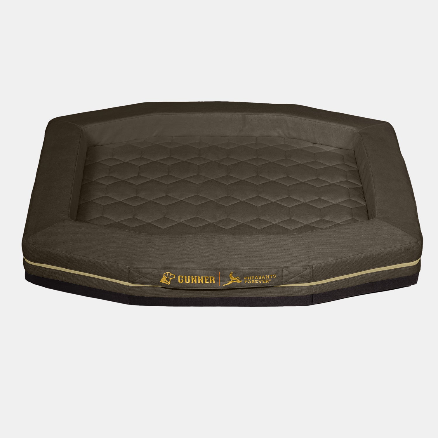The HOMESTEAD DOG BED Pheasant Brown by GUNNER is a large, rectangular bed with quilted padding and raised edges. It features the GUNNER logo and bird icon on the front, showcasing a Pheasants Forever collaboration. Background is plain white.