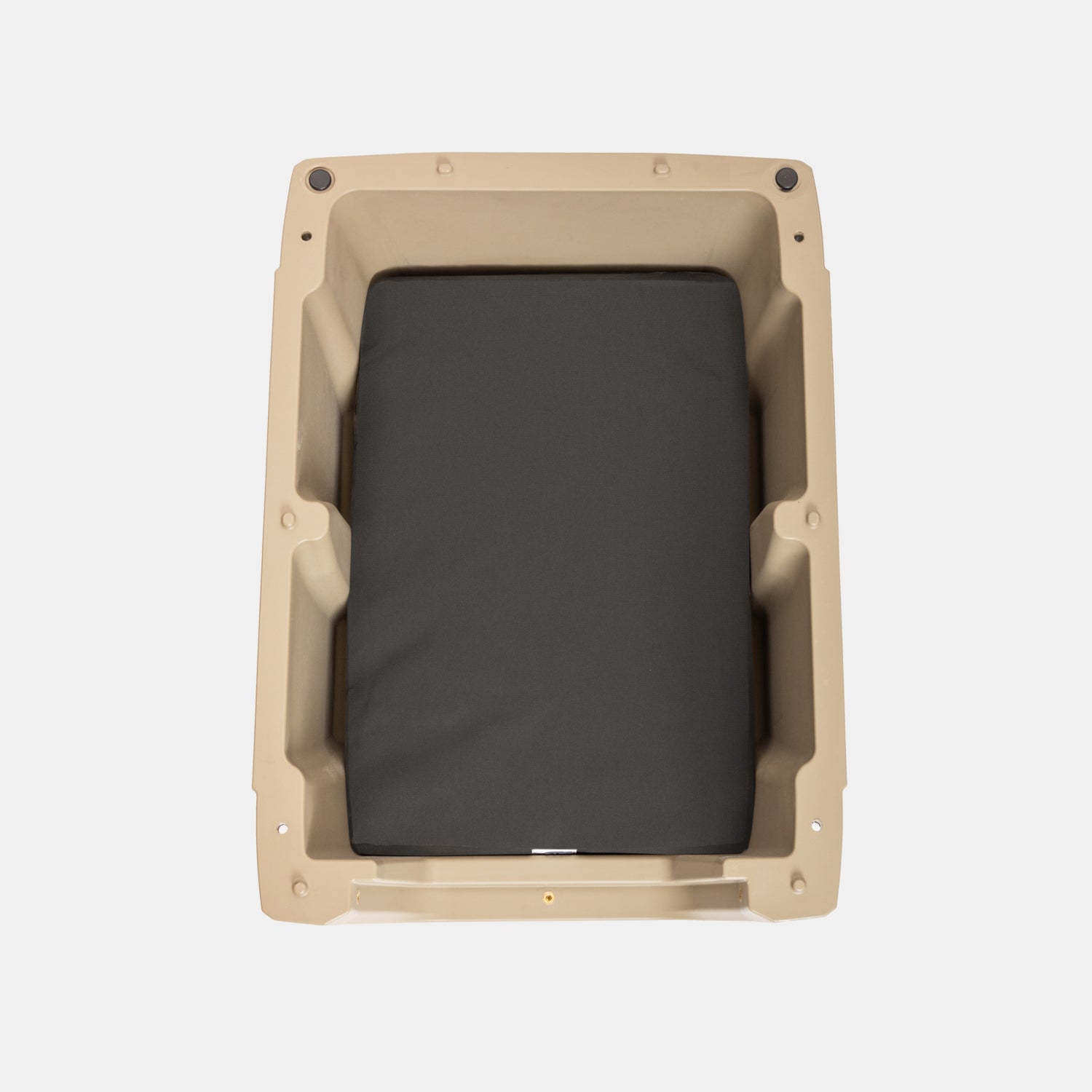 Rectangular pet door with a black interior on a beige frame against a white background
