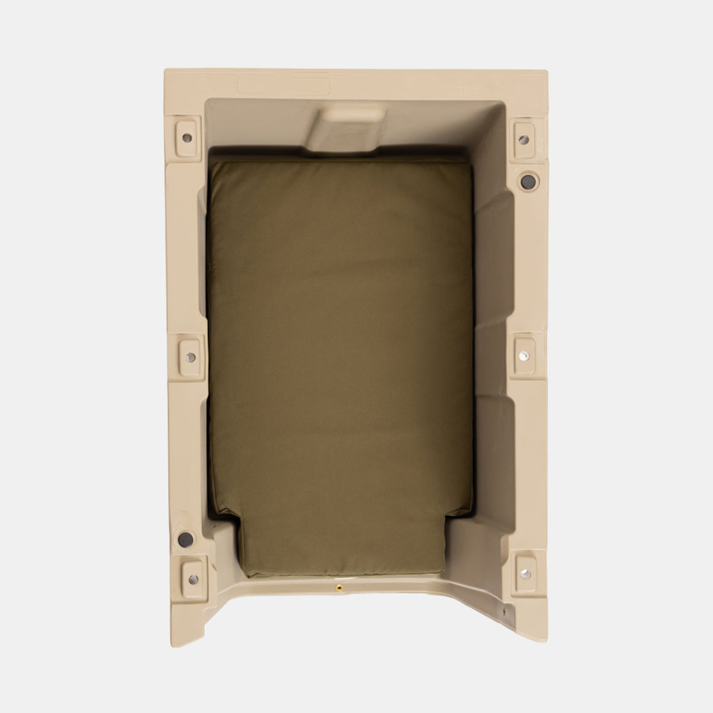 The GUNNER LONG HAUL BED is a beige, rectangular plastic container with an olive green padded cushion—ideal as a durable dog bed or cozy kennel bed for your pet, shown from above on a white background.