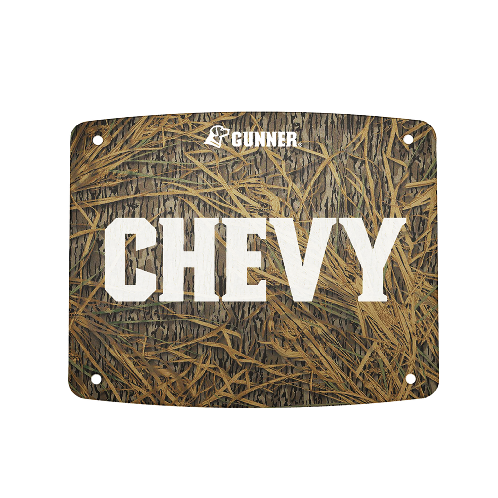 The GUNNER FOOD CRATE NAME PLATE features a camouflage grass background, large white text for your custom name, and a white dog logo with GUNNER above it. Four corner holes make mounting easy.