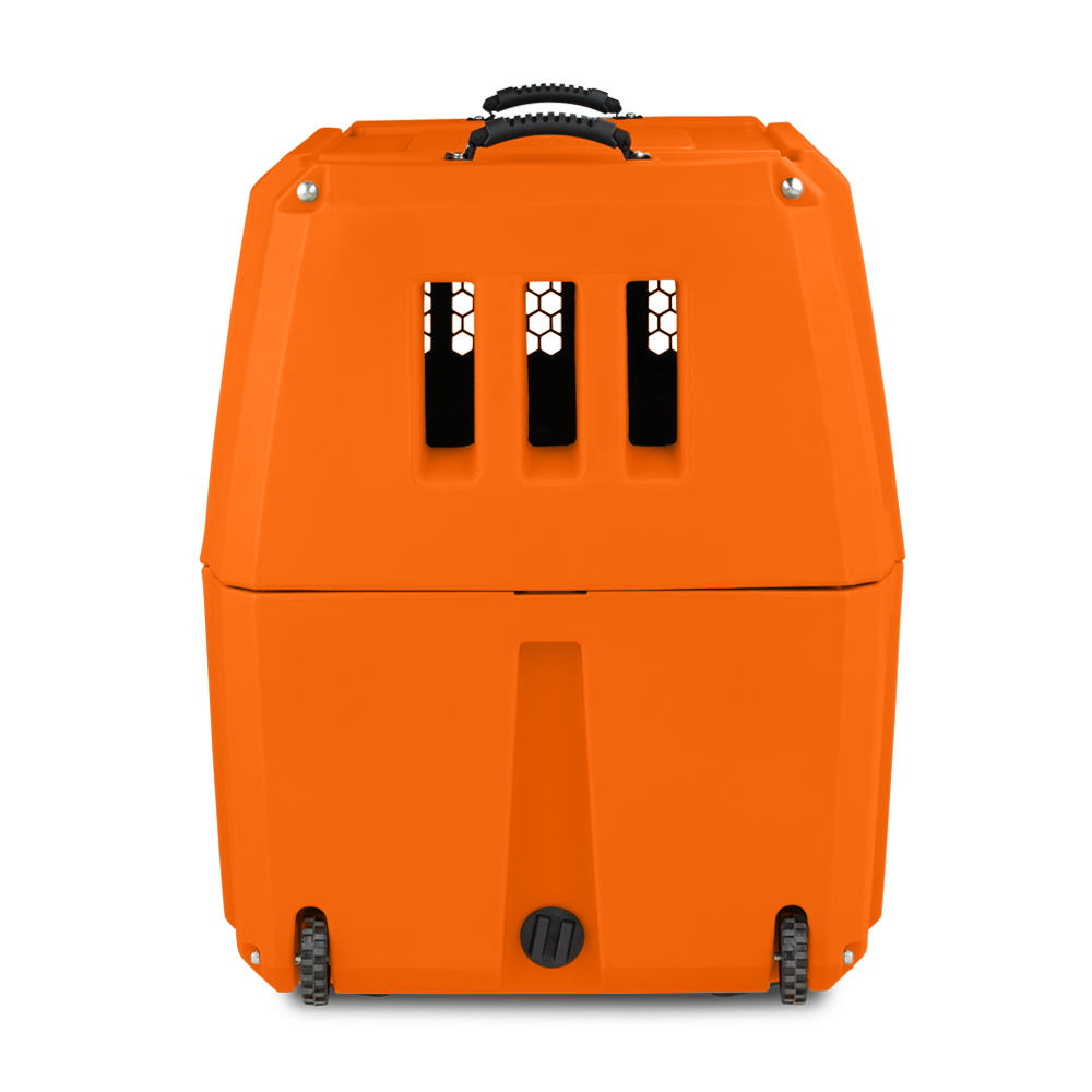 The GUNNER G1™ KENNEL - BLAZE ORANGE features a bright orange hard shell, ventilation slits, hexagonal mesh, a top handle, two bottom corner wheels, and a round front latch. Set against a plain white background.