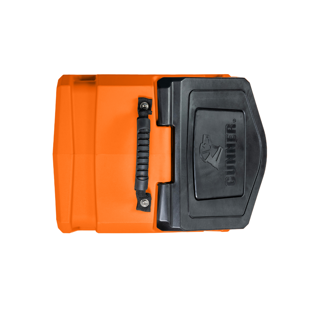 The GUNNER FOOD CRATE - BLAZE ORANGE by GUNNER is a limited-edition, orange and black hard-sided dog food storage container with a top handle and GUNNER embossed on the lid, shown against a white background.